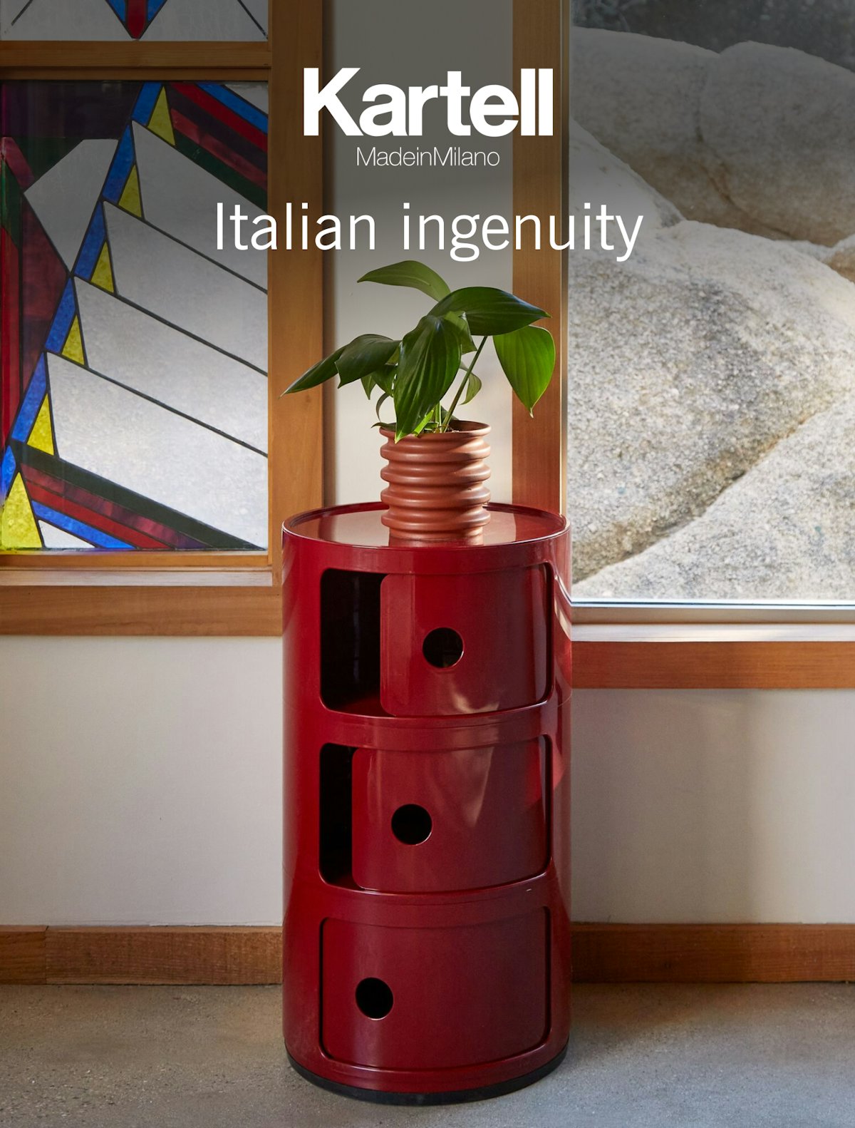 Red Medium Componibili Storage Unit holding a potted plant in a home setting