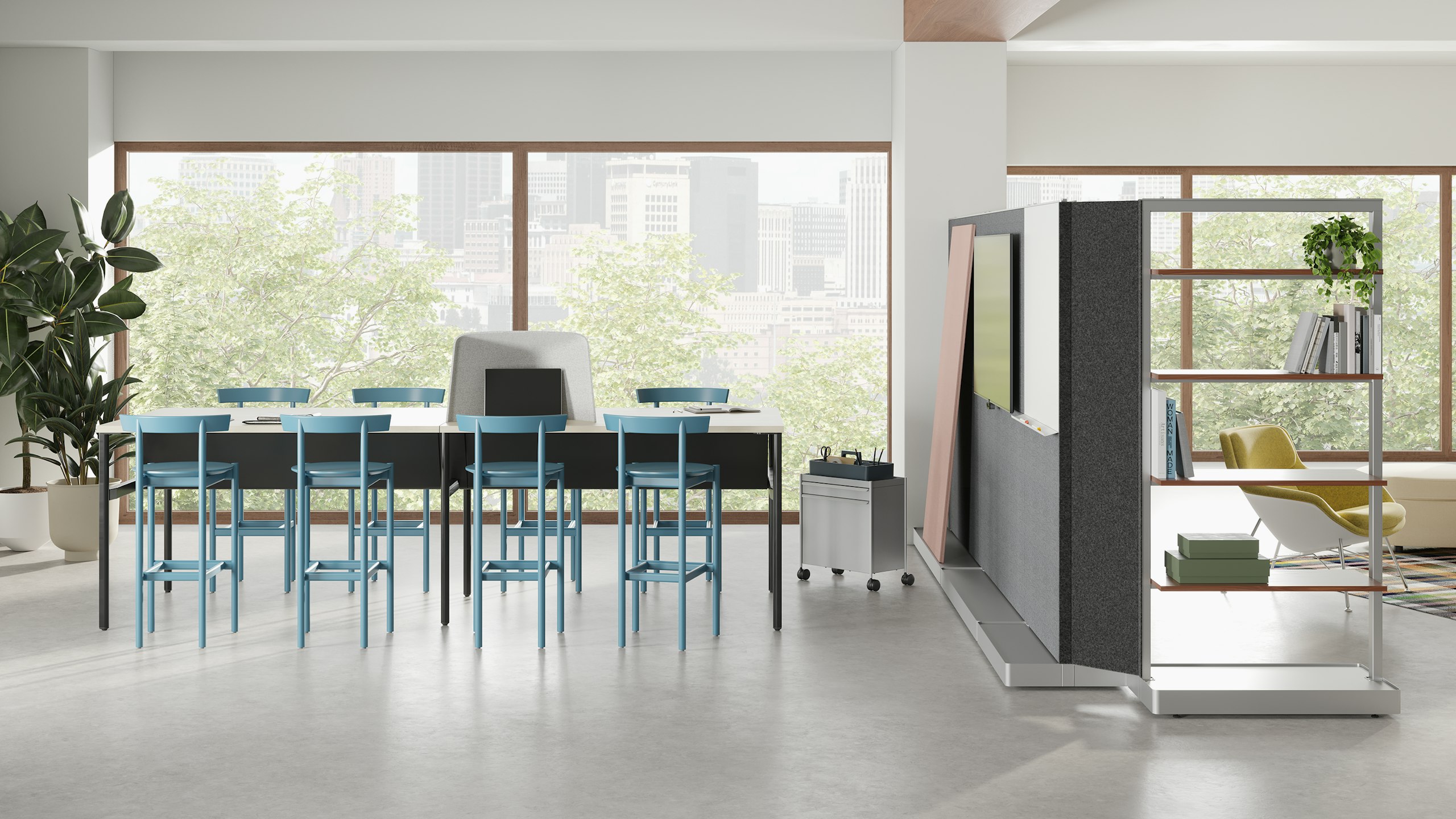 Open plan office space with black OE1 Communal Table and blue Comma Stools, grey OE1 Agile Walls and an OE1 Storage Trolley with OE1 Workbox.