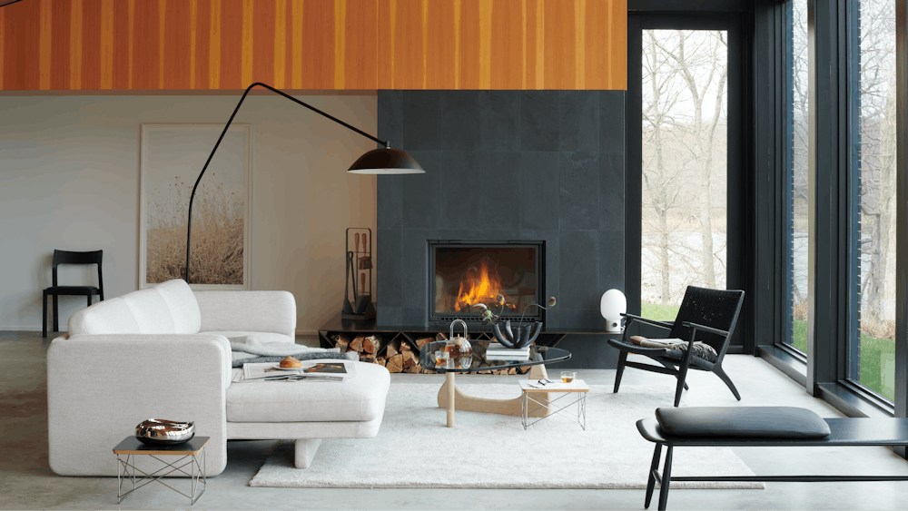 Pastille Sectional Chaise,  Noguchi Table,  Eames Wire Base Low Table,  Cobra Bowl,  Venule 5 Way Vase,  Sten Floor Lamp,  CH25 Easy Chair,  Setosa Handknottted Silk Rug,  Emma Fireplace Tools,  Desert Flora No. 0996 by Cas Friese,  JWDA Table Lamp,  Von Bench,  Profile Chair