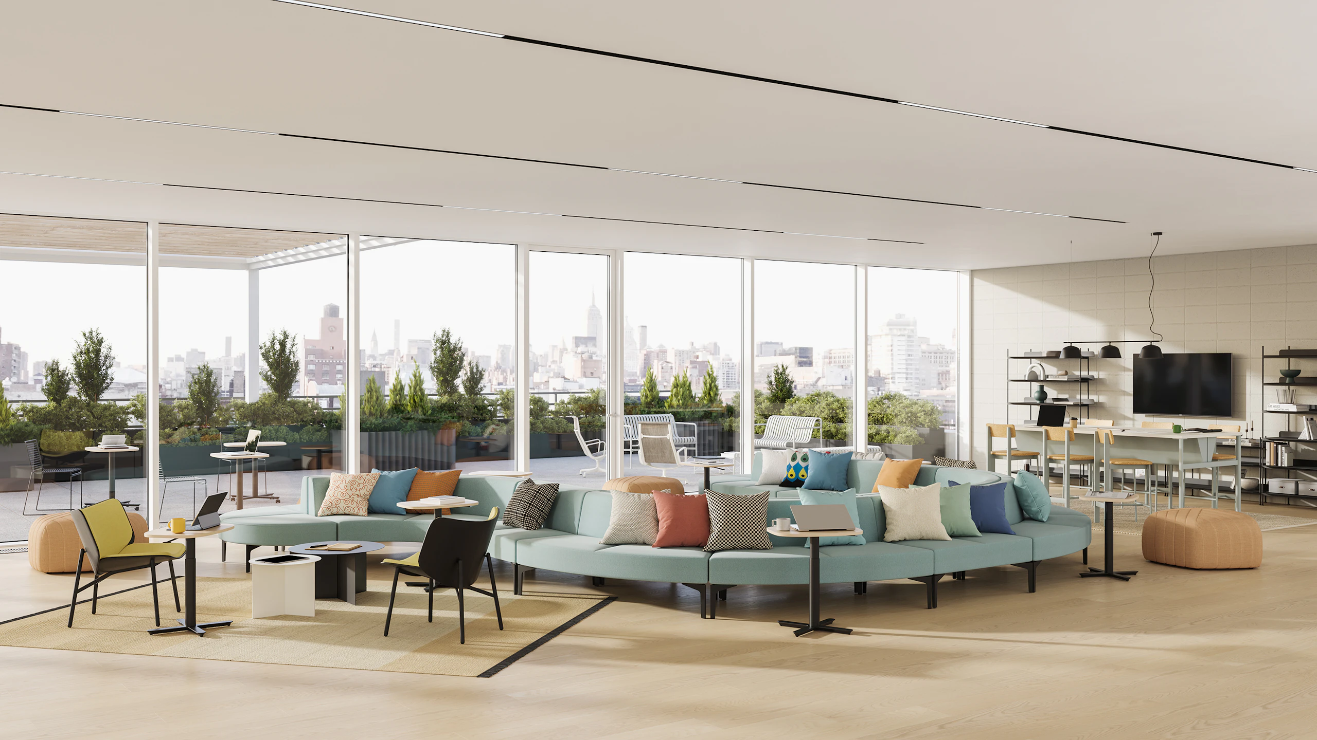 A selection of large and small Passport Work Tables are featured in a community socialization setting that has indoor and outdoor elements.