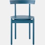 A blue Comma Chair, viewed from the front.