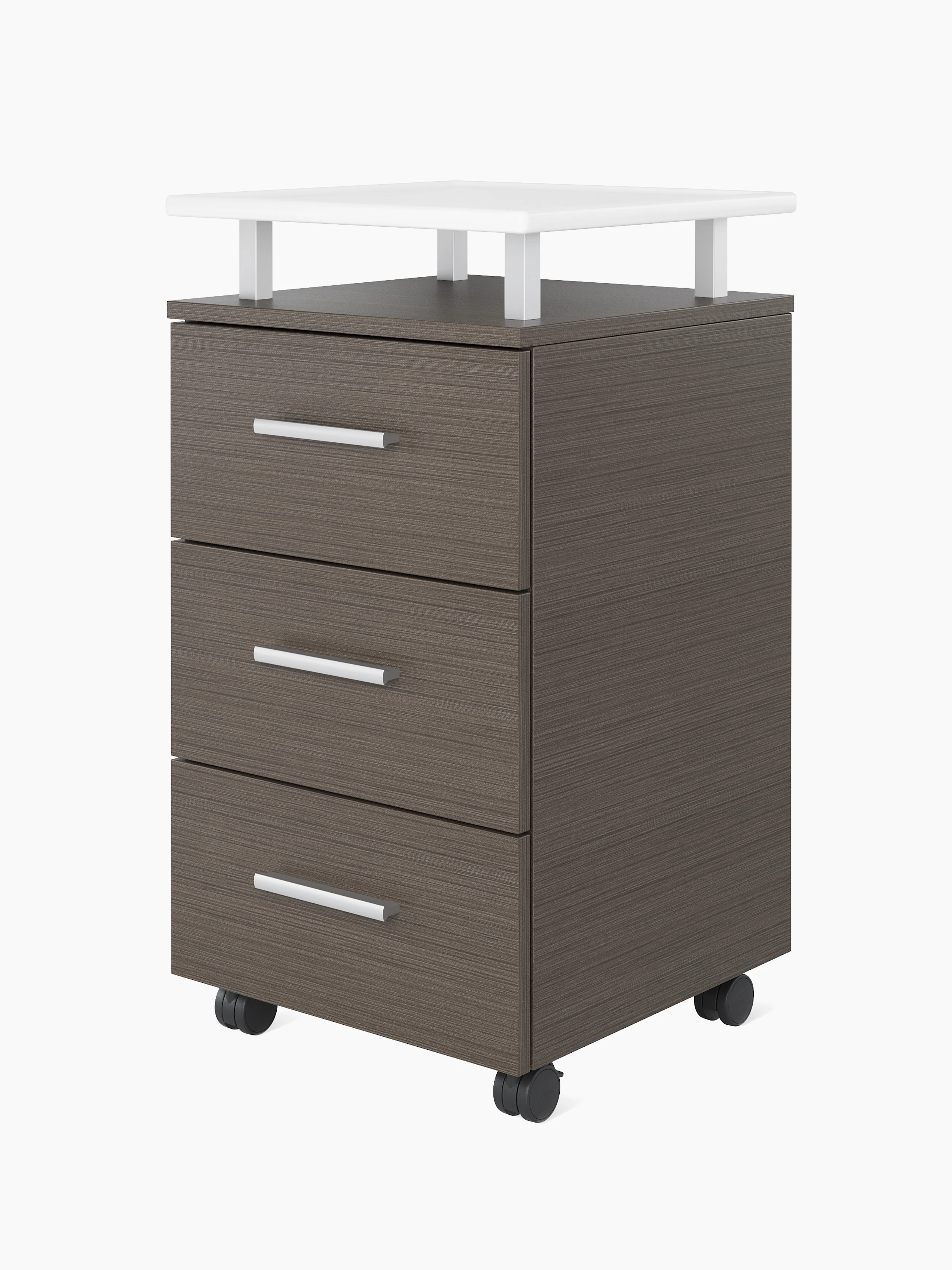 Angled view of a single Nemschoff Bedside Cabinet in a twill graphite finish with three drawers, silver profile pulls, a raised top in a white Corian, and casters.