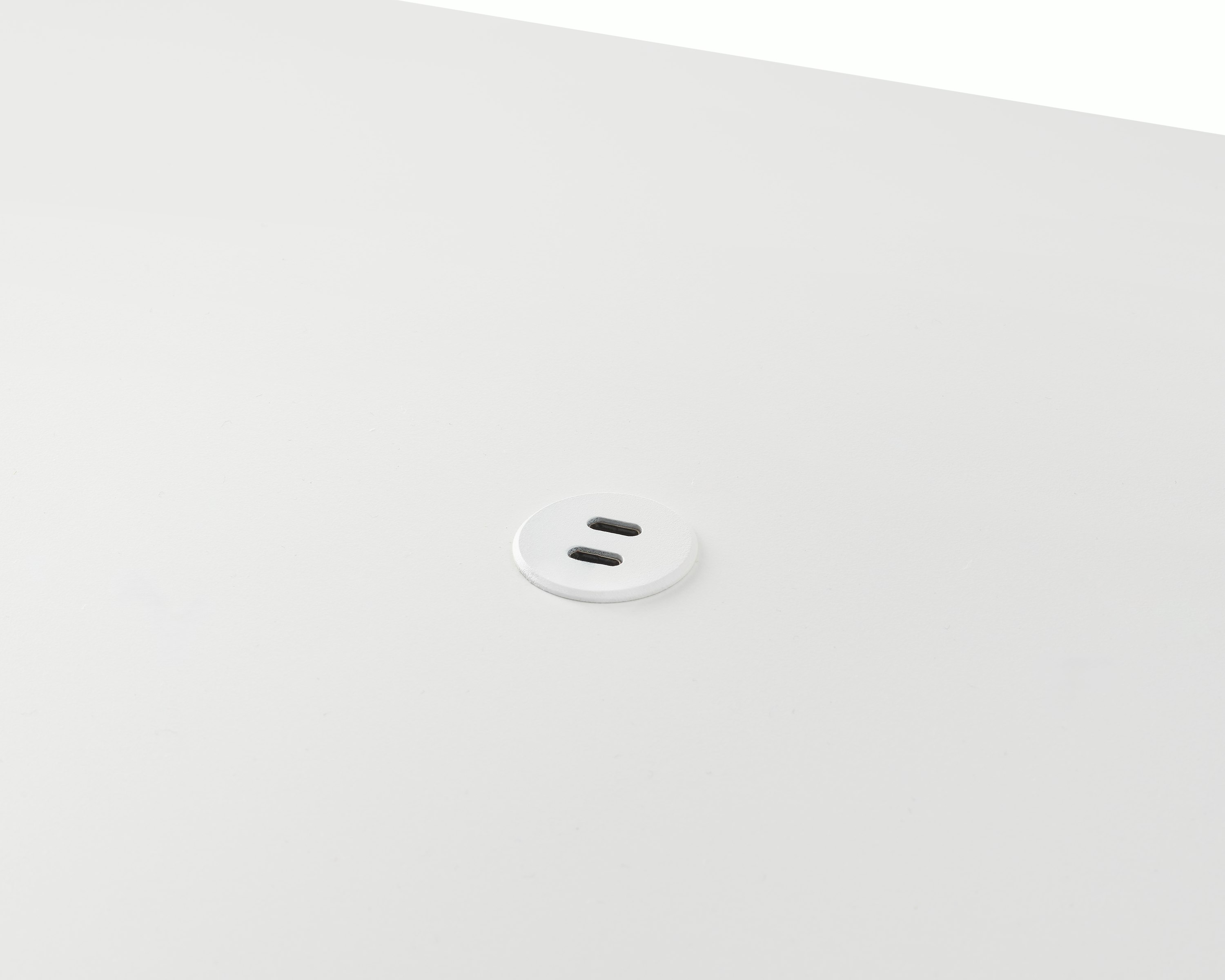 Surface-integrated dual port USB-C power solution shown in white.