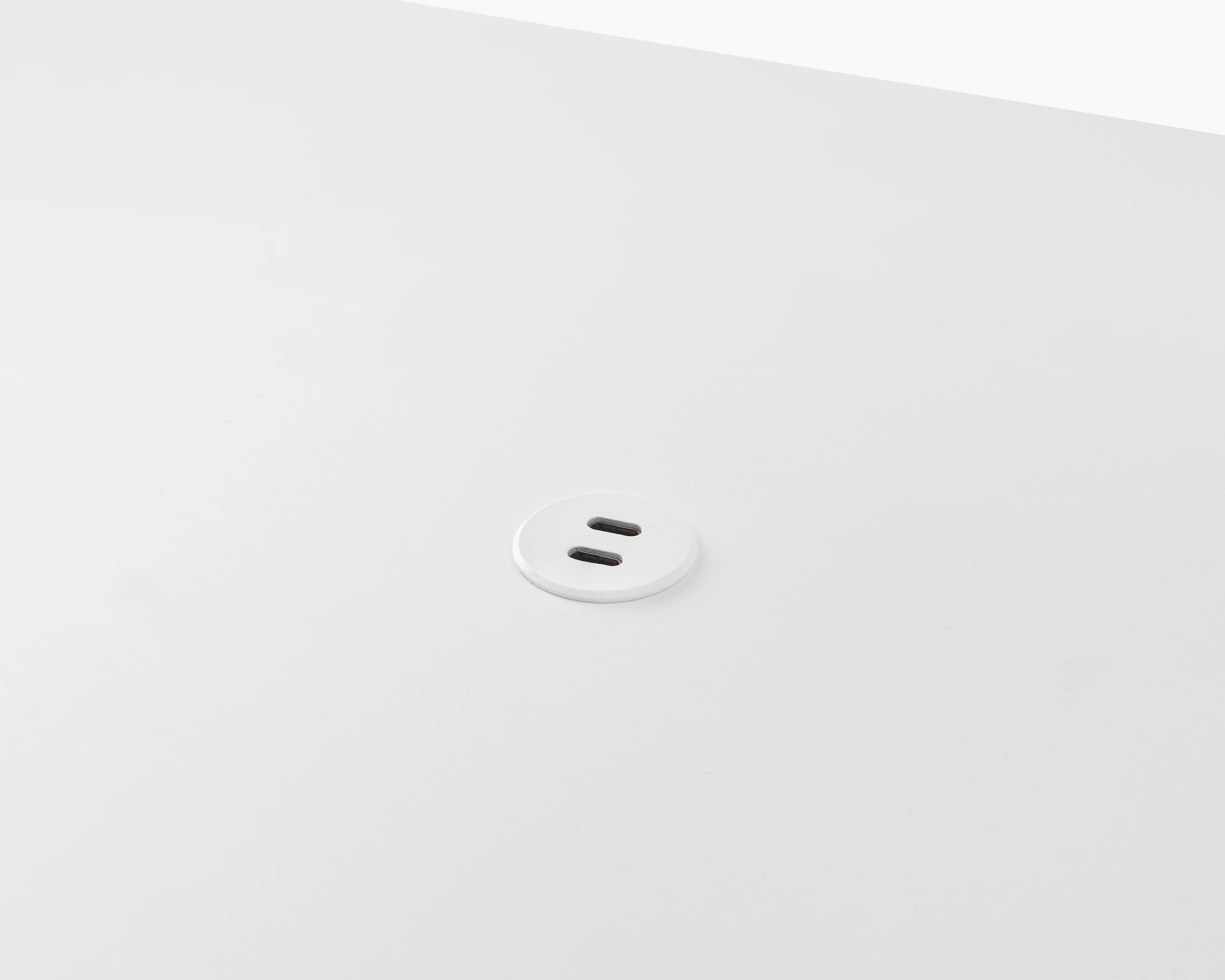 Surface-integrated dual port USB-C power solution shown in white.