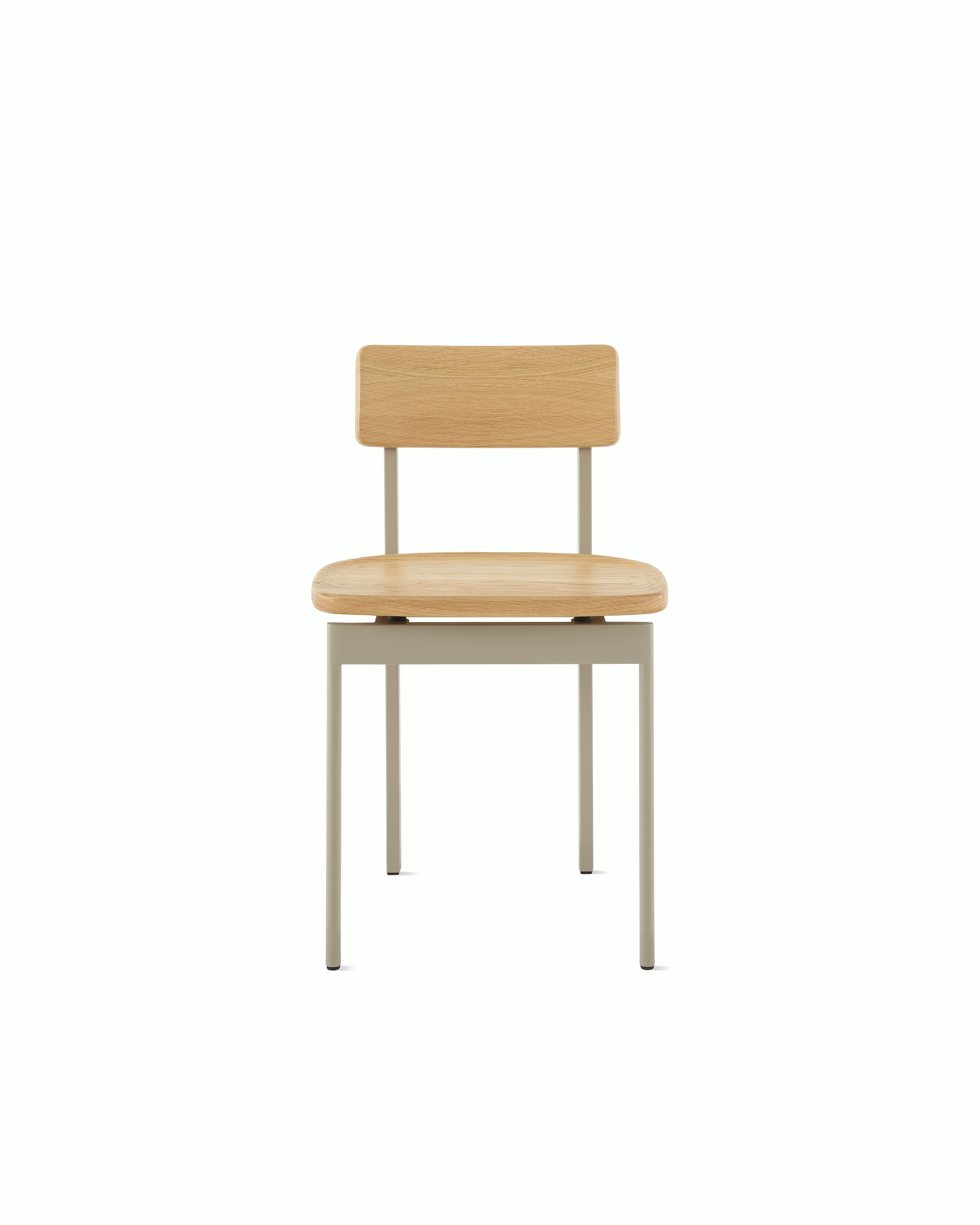 A Betwixt Chair with an oak seat and backrest with a grey frame. 