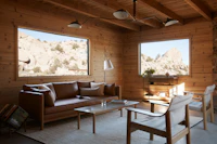 Emmy Sofa and Serge Mouille Ceiling Lamp
