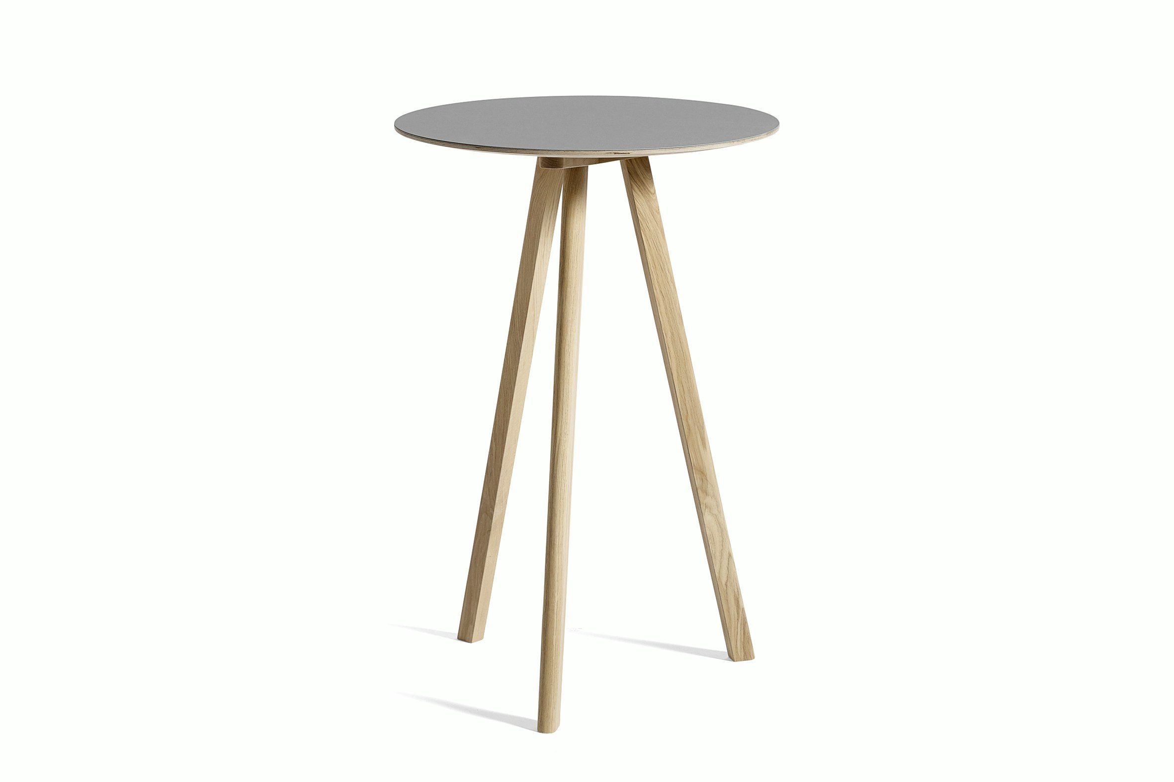 Grey Copenhague Bistro Table with wooden legs, viewed at an angle.