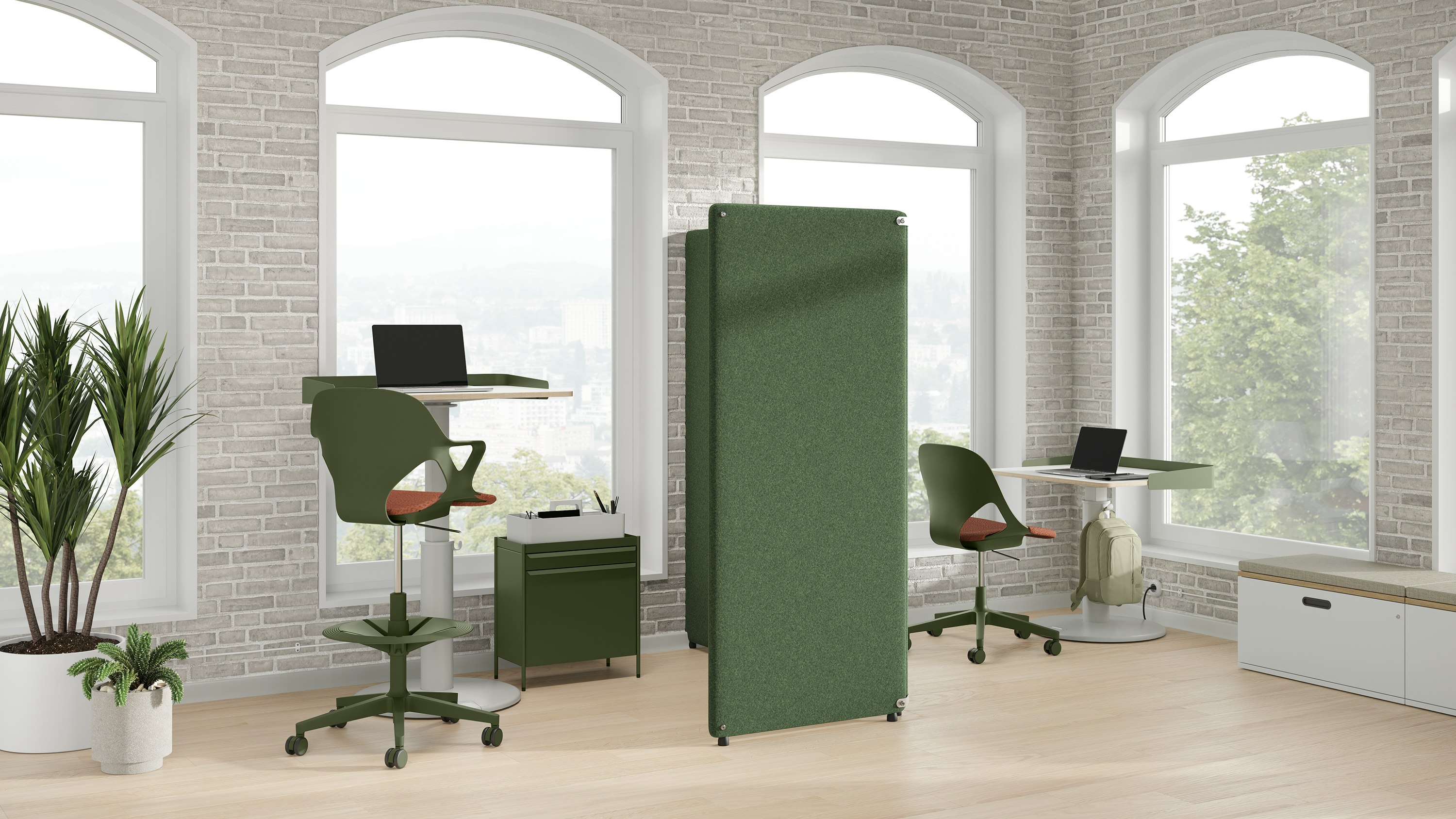 Bright office with a green Bound Freestanding Screen, green OE1 Storage Trolleys, green Zeph Chair and OE1 Sit-Stand Tables.