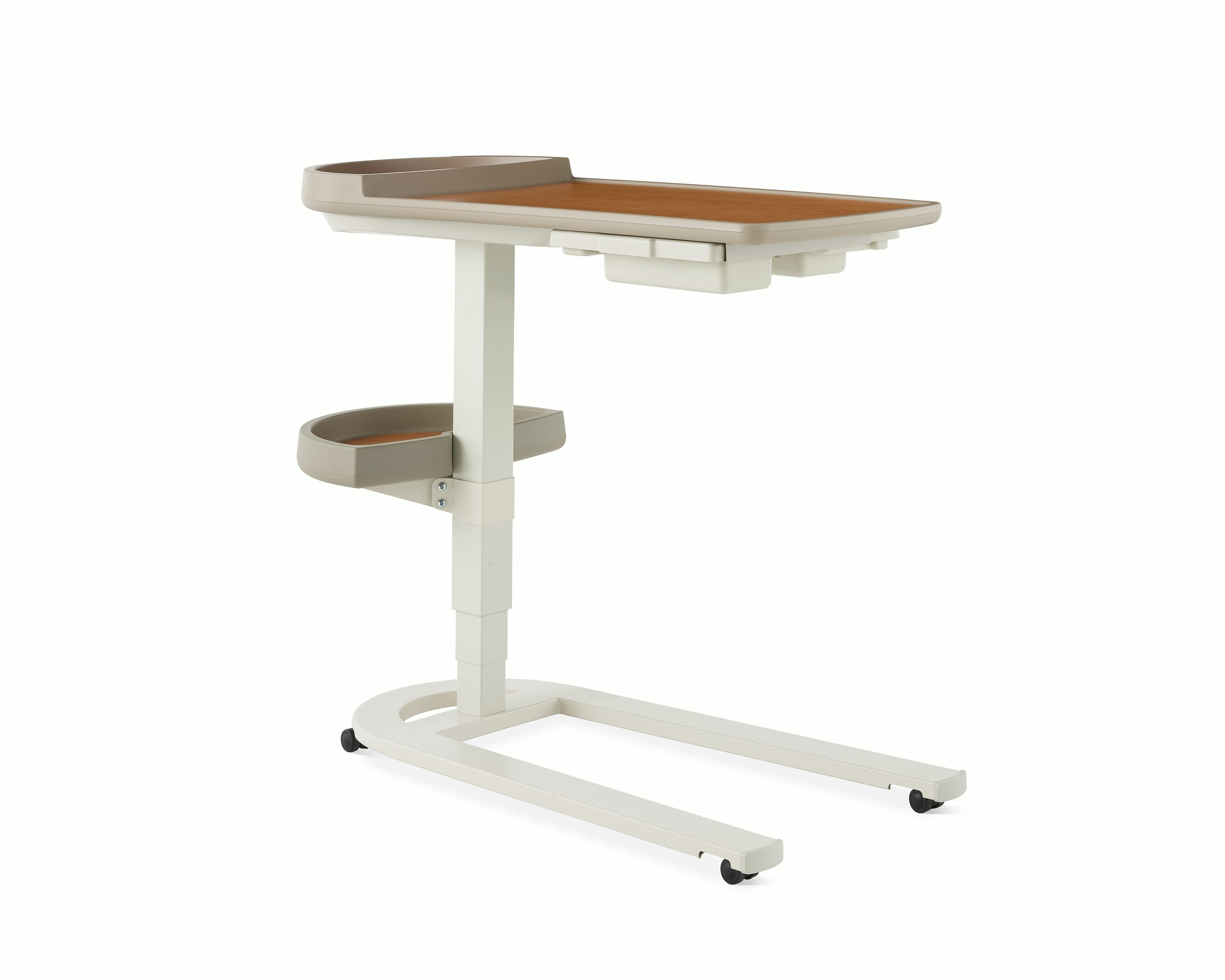 Angled view of Mirage Overbed Table with laminate top and tray with urethane edge with a U-base in a light gray finish.