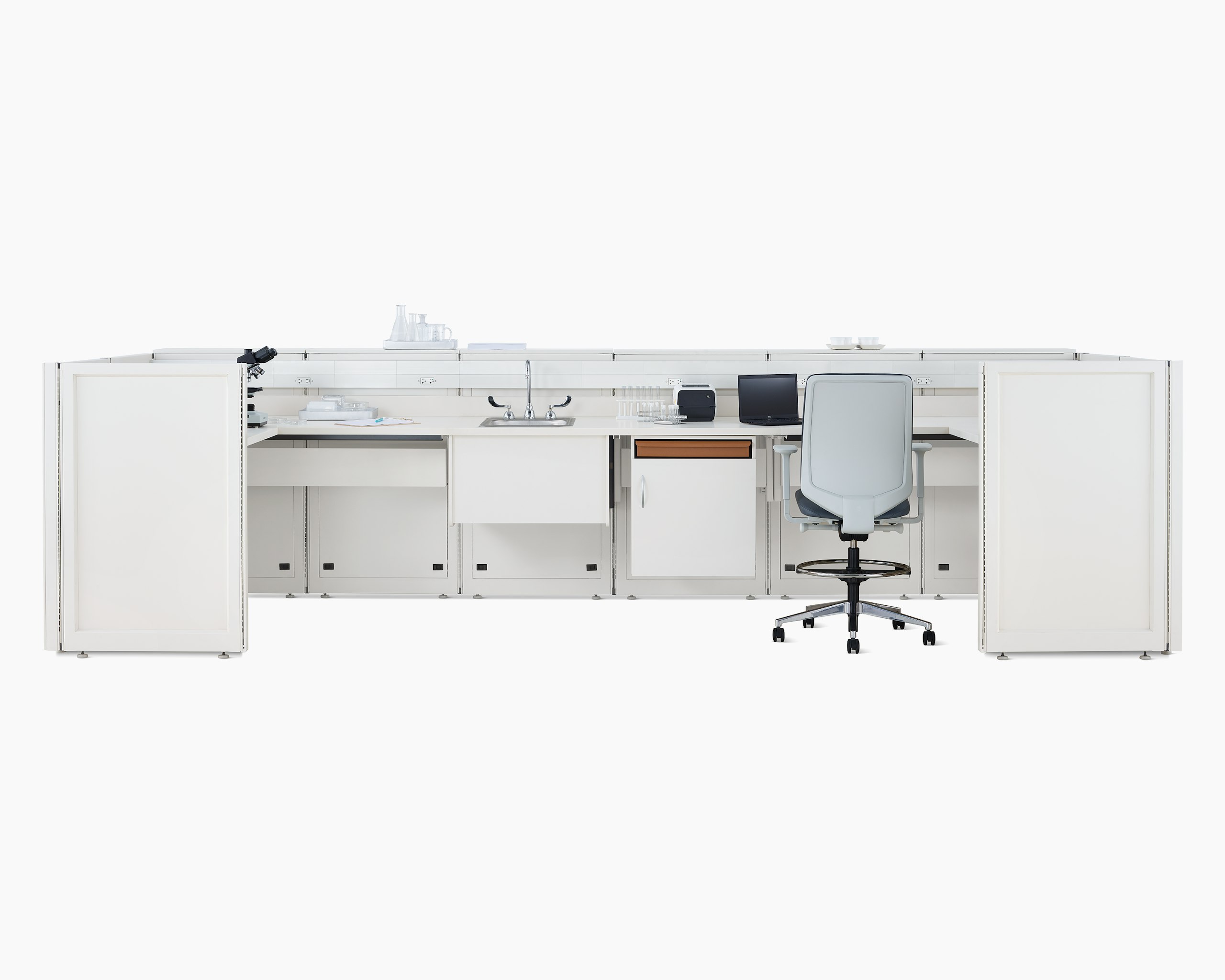 Co/Struc System laboratory bench in soft white with under surface storage, sink, and Verus Stool in light gray.