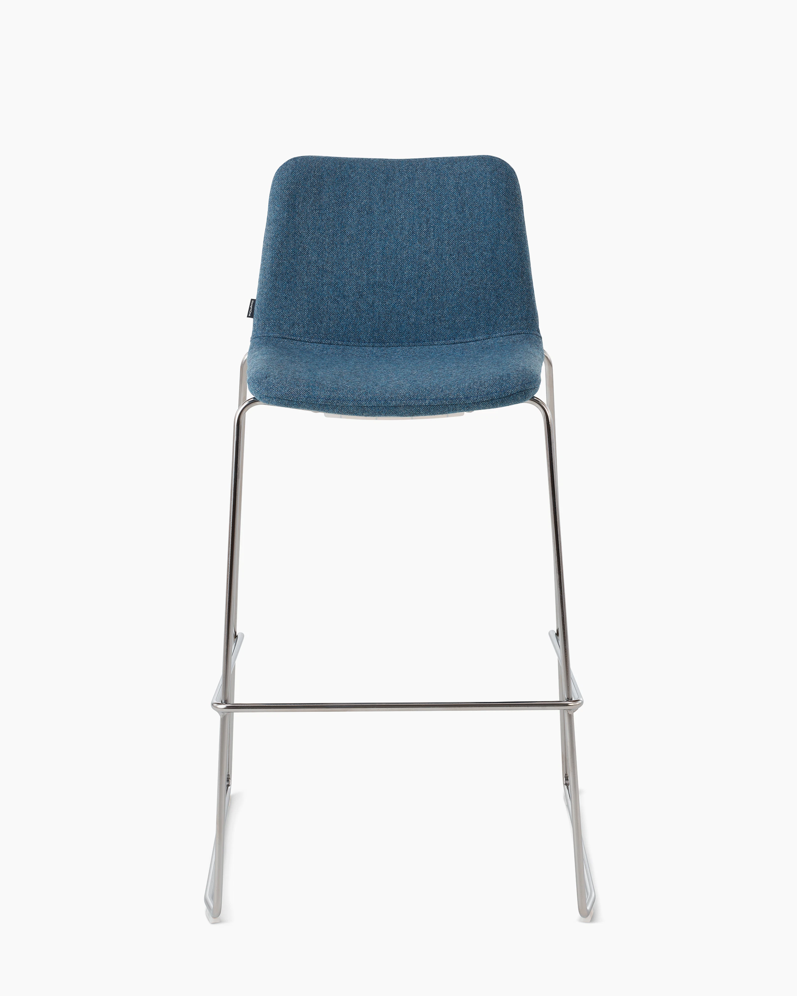 White sweep of Viv stool with blue fabric and polished aluminium sled base