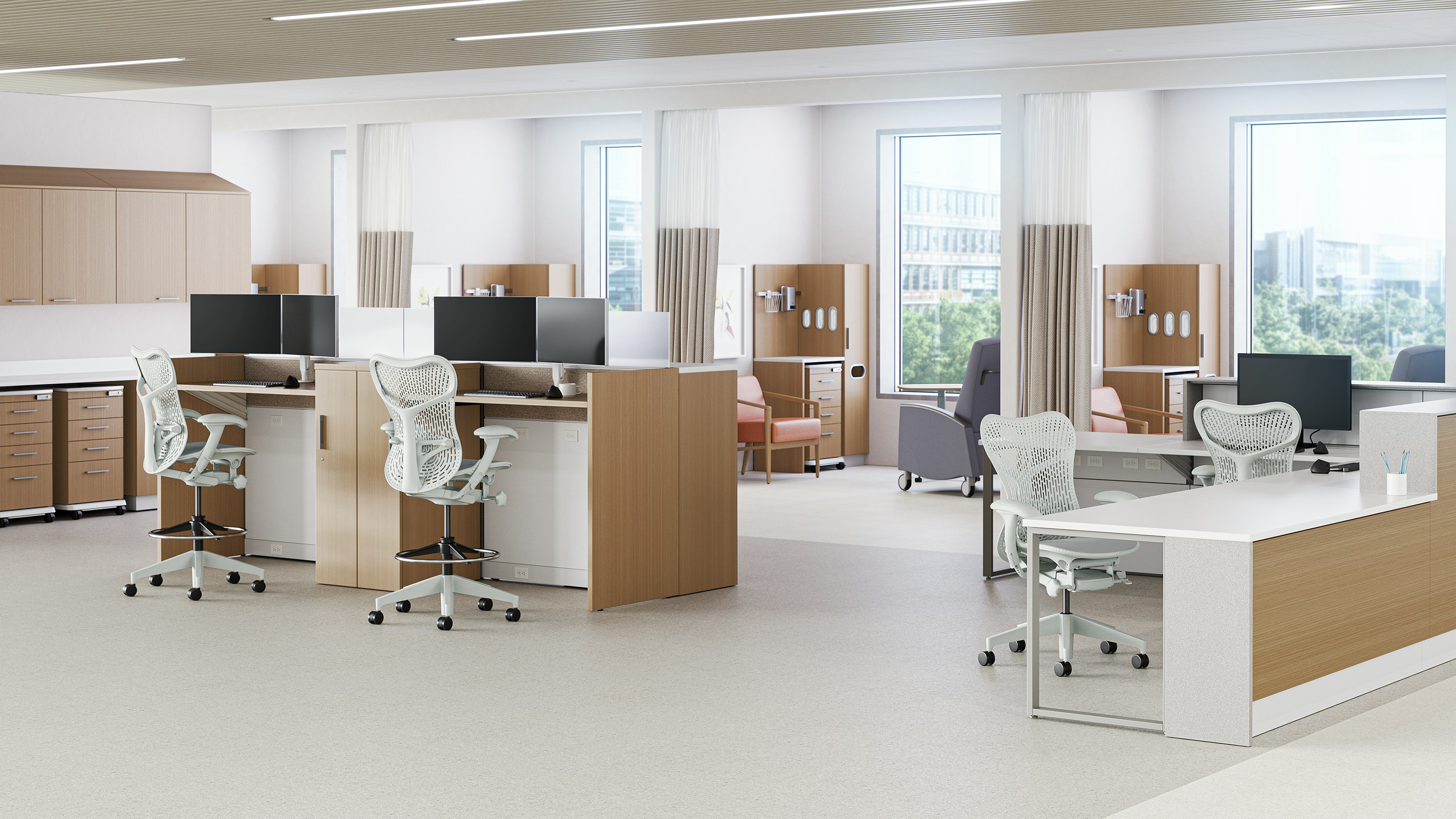 Mirra 2 chairs and stools in alpine in a caregiver environment with the Commend Nurses Station boundary, Canvas workstations and exam rooms in the back.