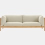 A front view of a tan Arbour Sofa.