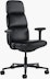 Front angle view of a high-back Asari chair by Herman Miller in black leather with height adjustable arms.