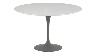 A Saarinen Round Dining Table on a white background