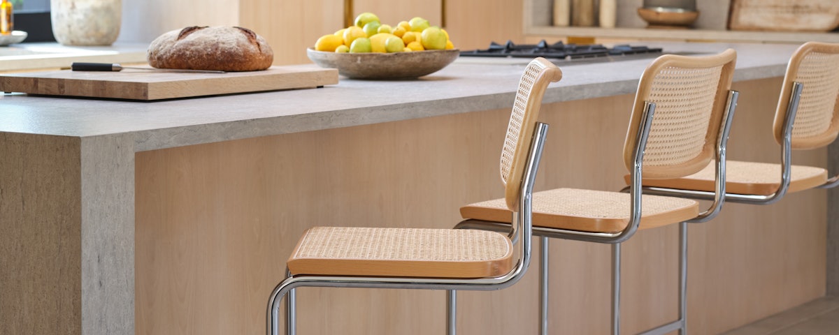 Cesca Stools at a kitchen counter with fruit and bread