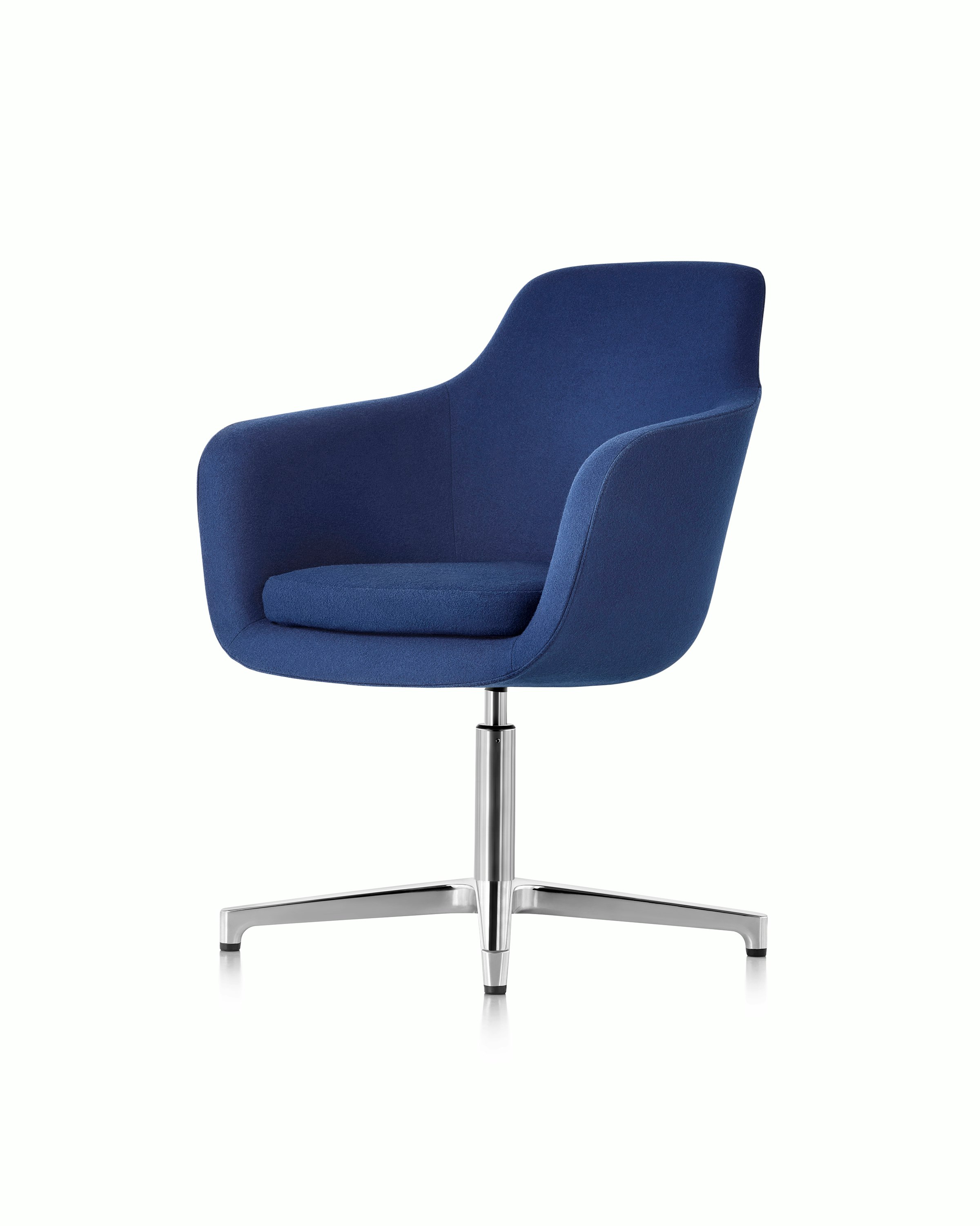 Angled view of a mid-back Saiba conference chair with dark blue upholstery and a four-star base.