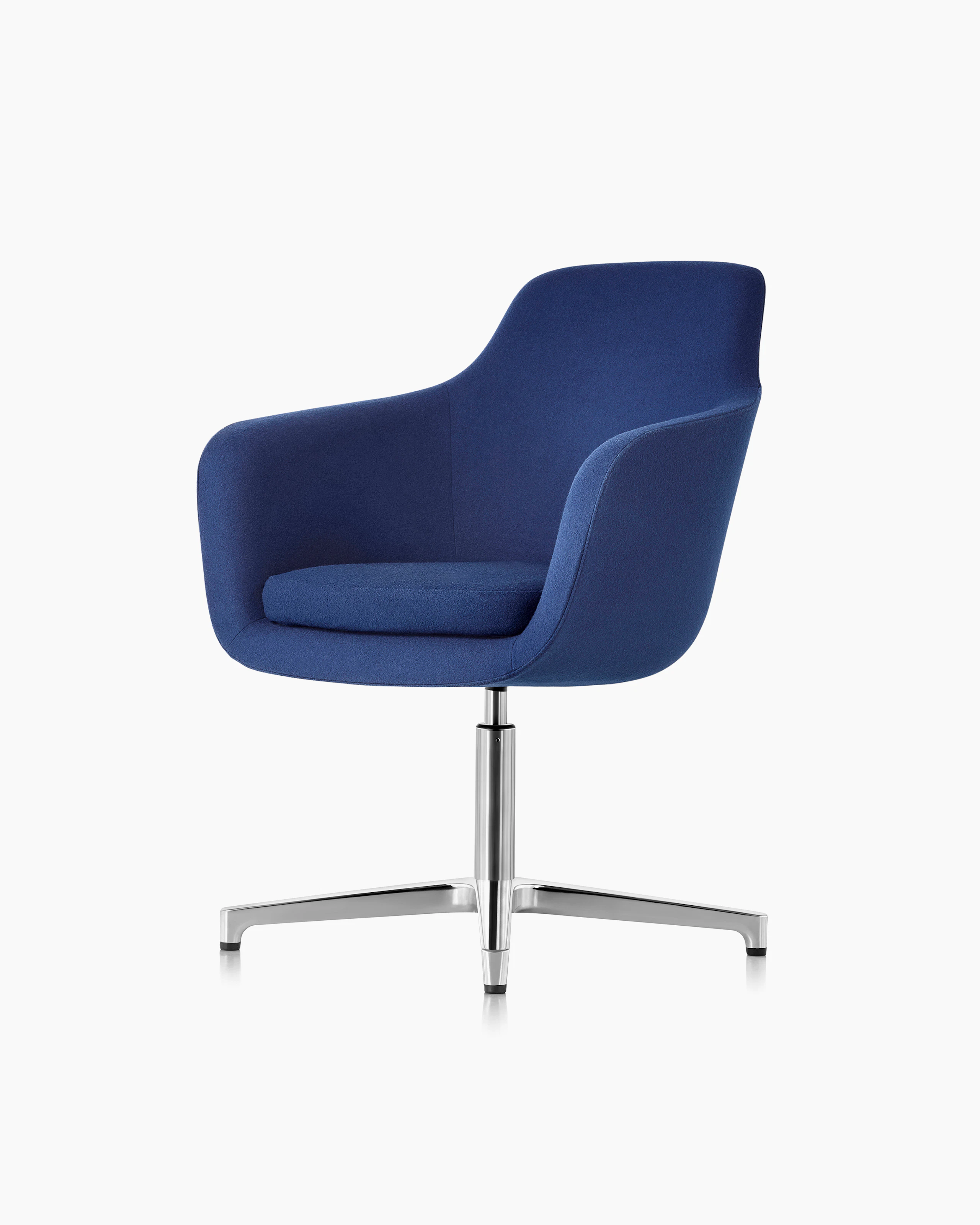 Angled view of a mid-back Saiba conference chair with dark blue upholstery and a four-star base.