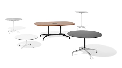 An assorted grouping of five Eames tables by Herman Miller