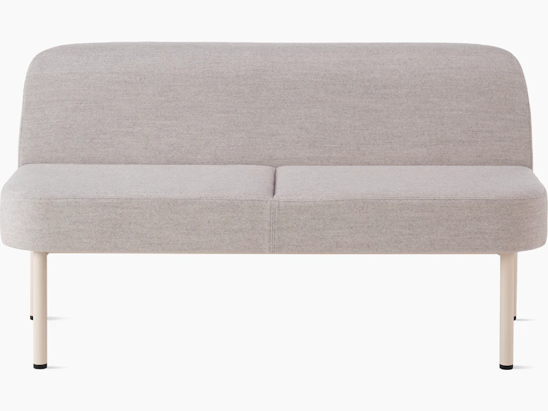 White sweep of Hue sofa with light grey fabric and oyster steel base
