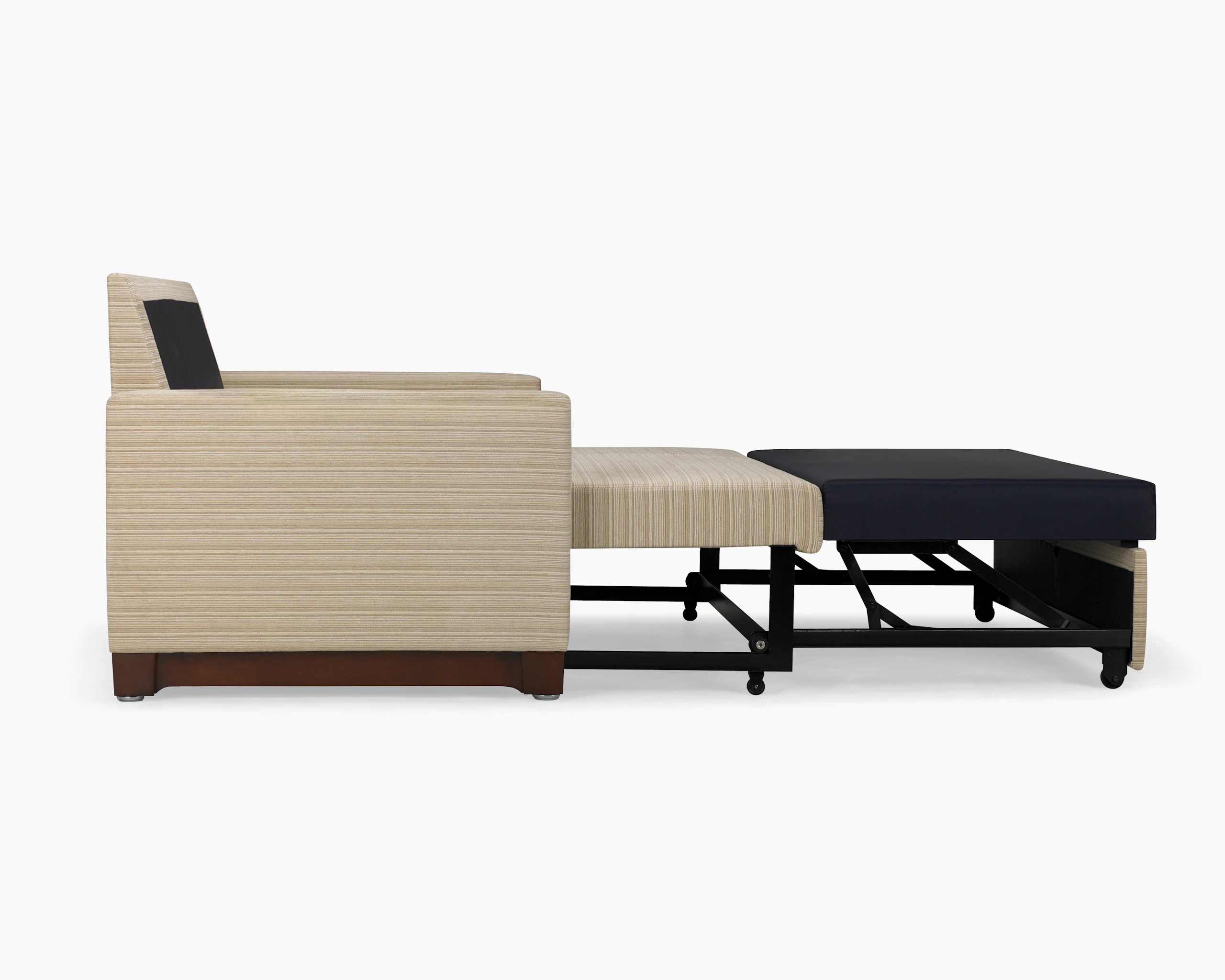 Nemschoff Beaumont Sleep Chair & Settee in tan upholstery with pull out bed in the sleep position, viewed from the side.