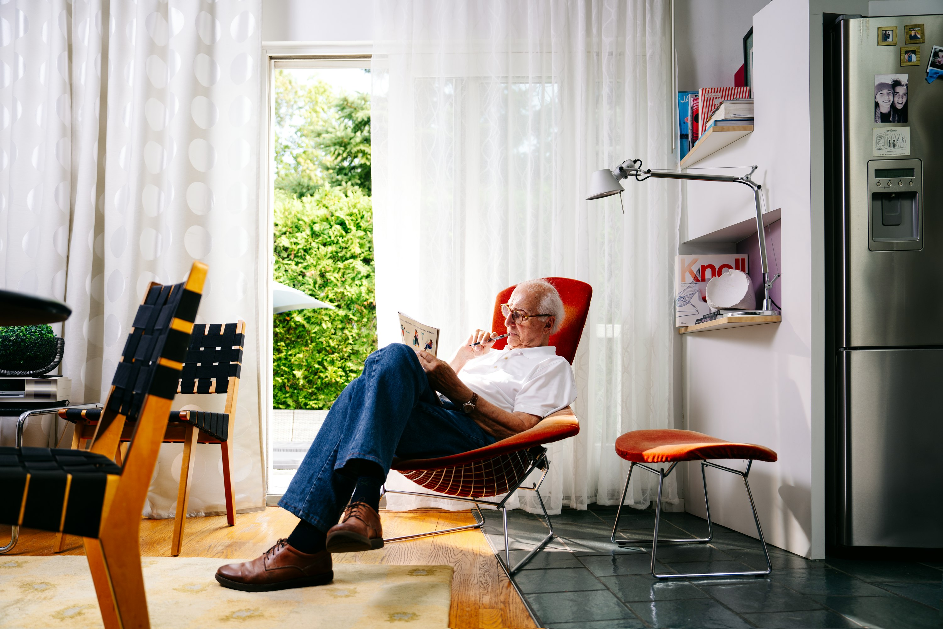 A Bird Chair by Harry Bertoia is Bruce's favorite spot to do crossword puzzles.