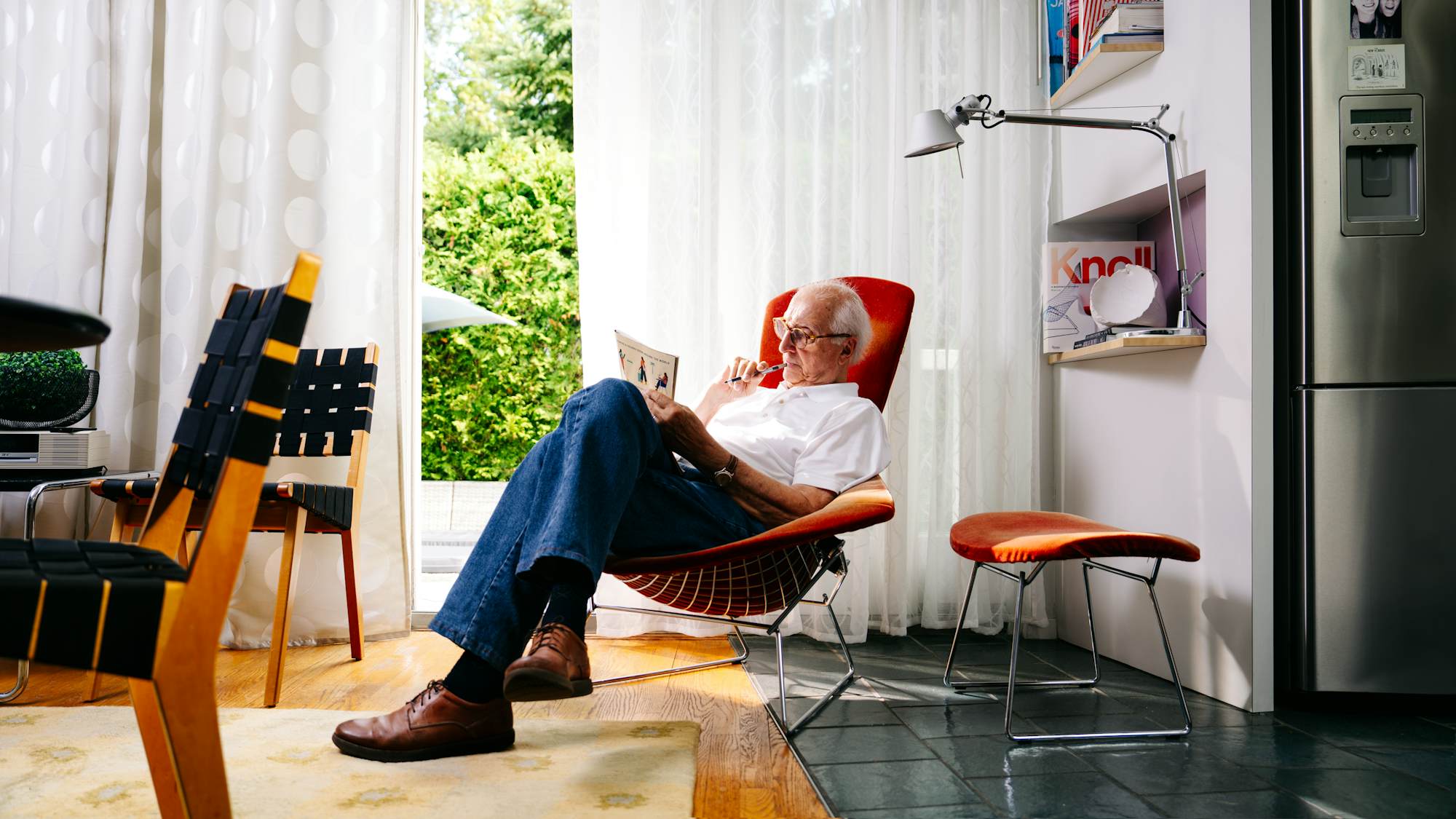 A Bird Chair by Harry Bertoia is Bruce's favorite spot to do crossword puzzles.