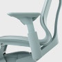 A glacier Cosm Chair with height adjustable arms.