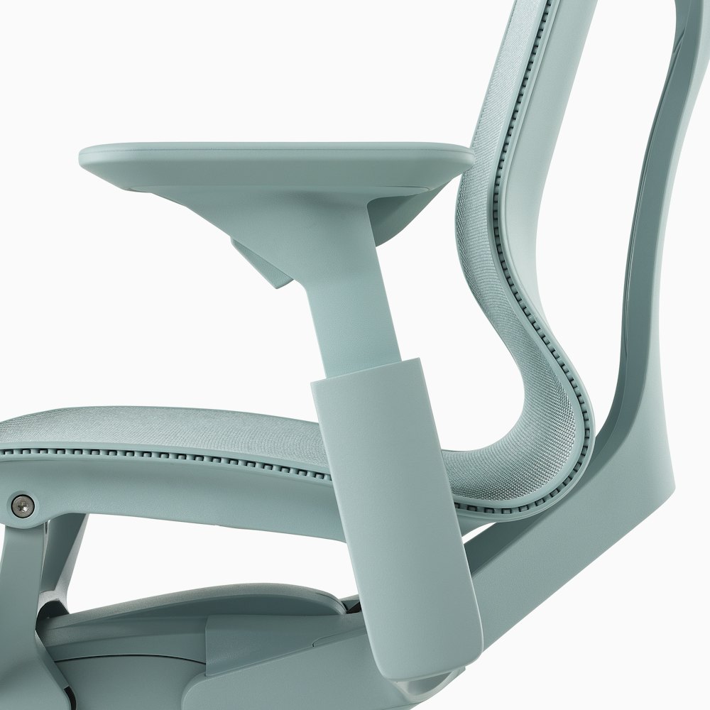 A glacier Cosm Chair with height adjustable arms.
