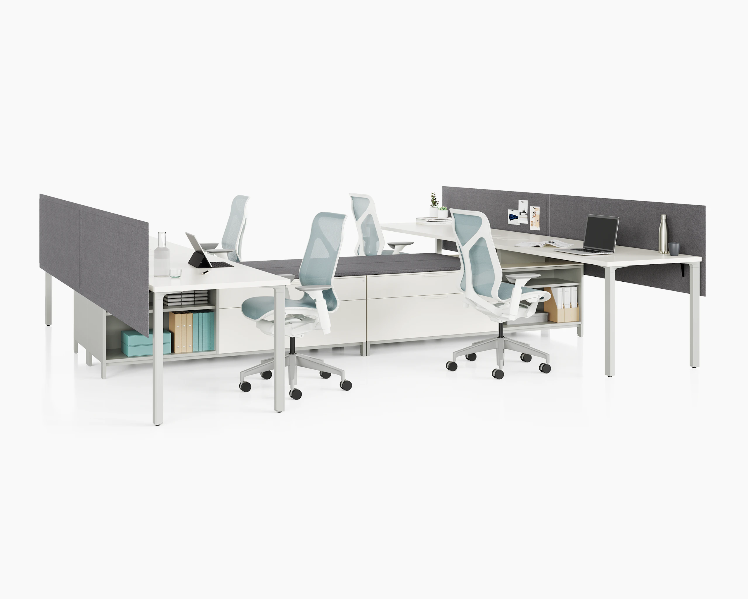 Group of four Canvas Storage workstations with white surfaces, grey screens, and light blue Cosm Chairs.