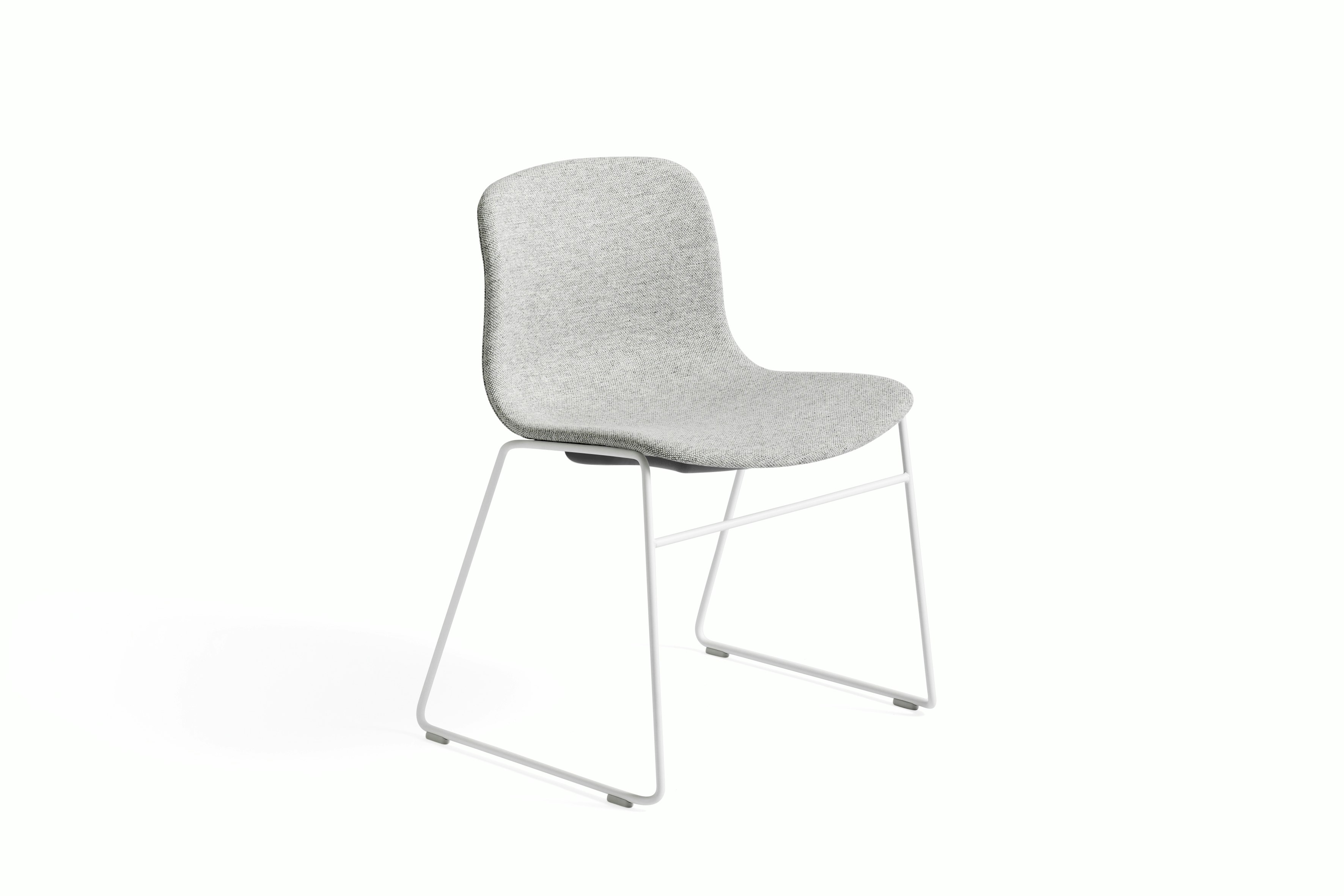 About A Chair grey upholstered seat shell on white wireframe sled base, front angled view.