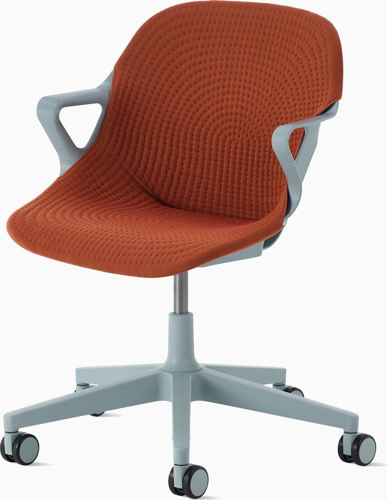Angle view of Glacier Zeph Chair with a cayenne unibody