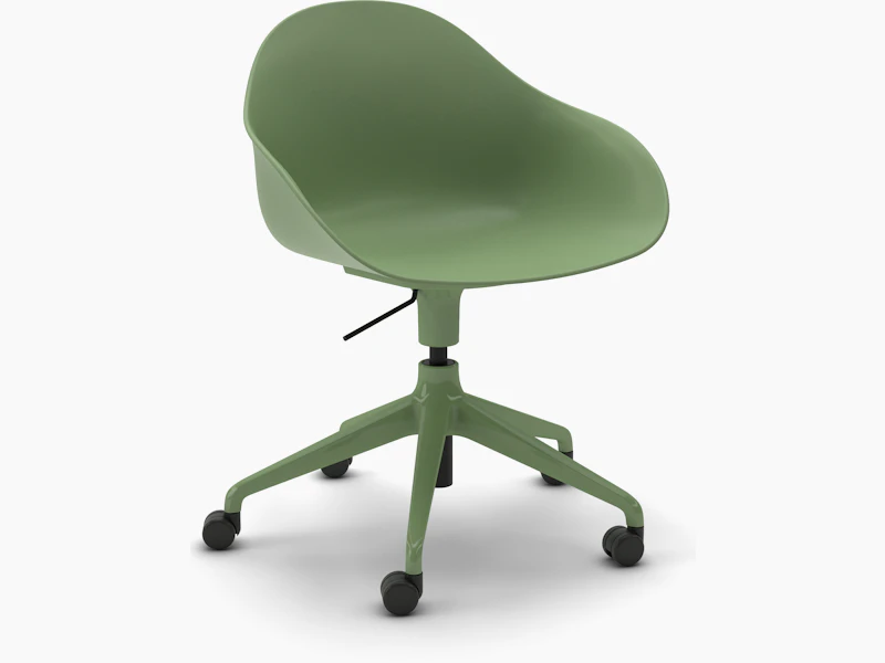 A three-quarter view of a green Ruby Chair on matching 5-star base with casters.