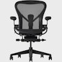 Black matte Aeron Chair on a white background with a 5-star base and ergonomic back support, viewed from the front.