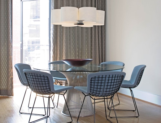 Platner Dining Table, Bertoia Side Chair Platner Dining Table and Bertoia Side Chairs with blue seat covers
