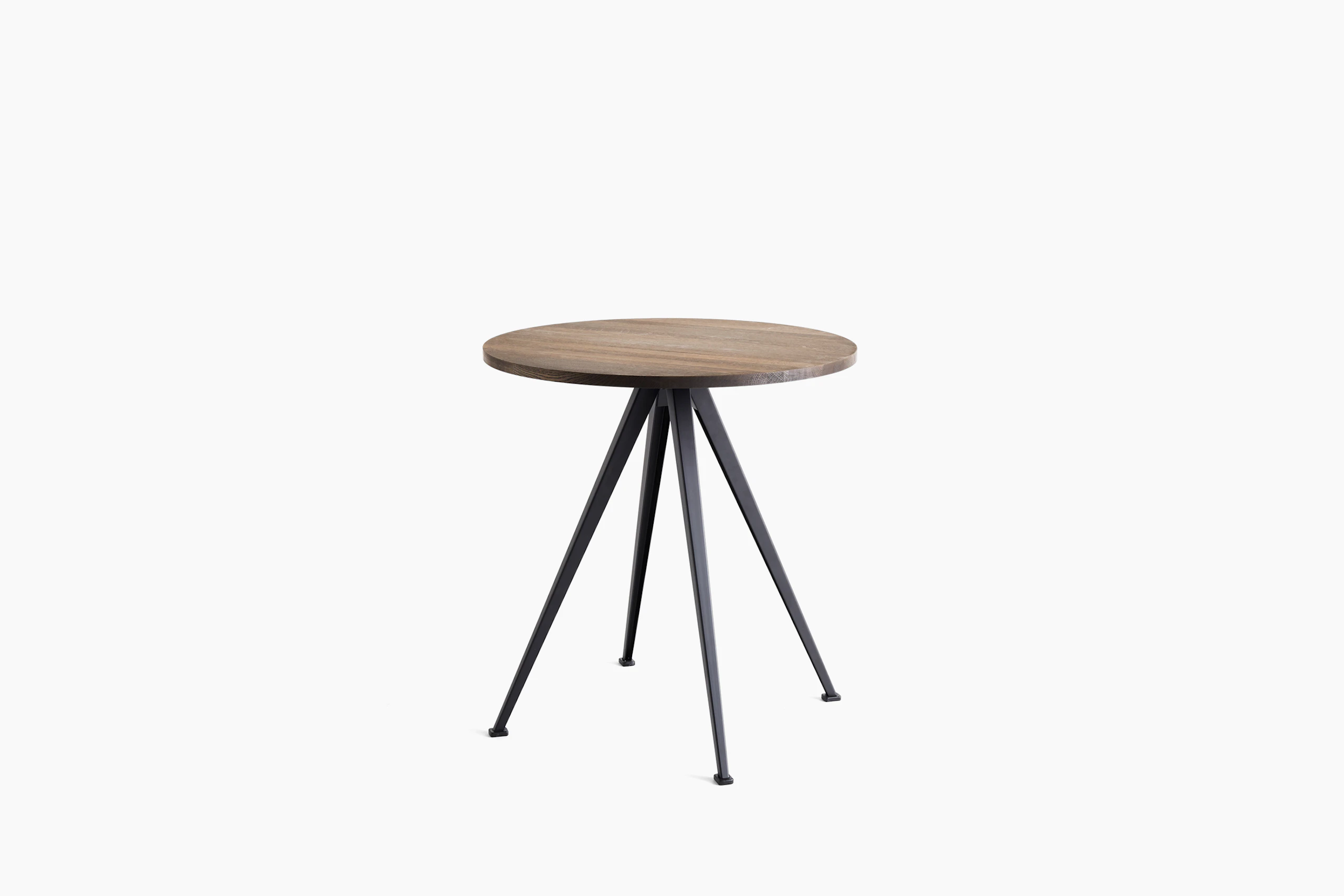 A front view of the Pyramid Cafe Table- round with Smoked Oak top and black frame.