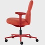 Side view of a mid-back Asari chair by Herman Miller in deep red with height adjustable arms.
