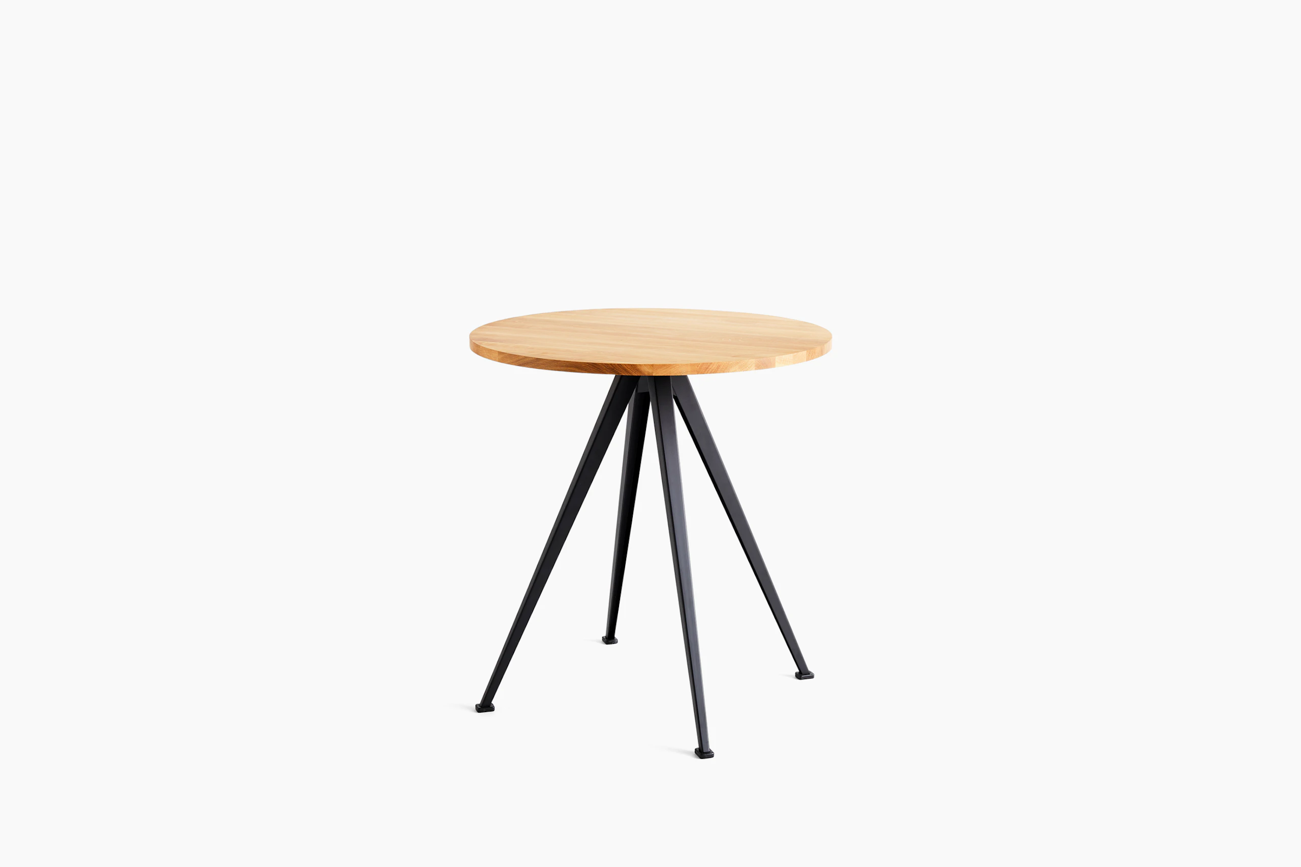 A front view of the Pyramid Cafe Table- round with Oak top and black frame.