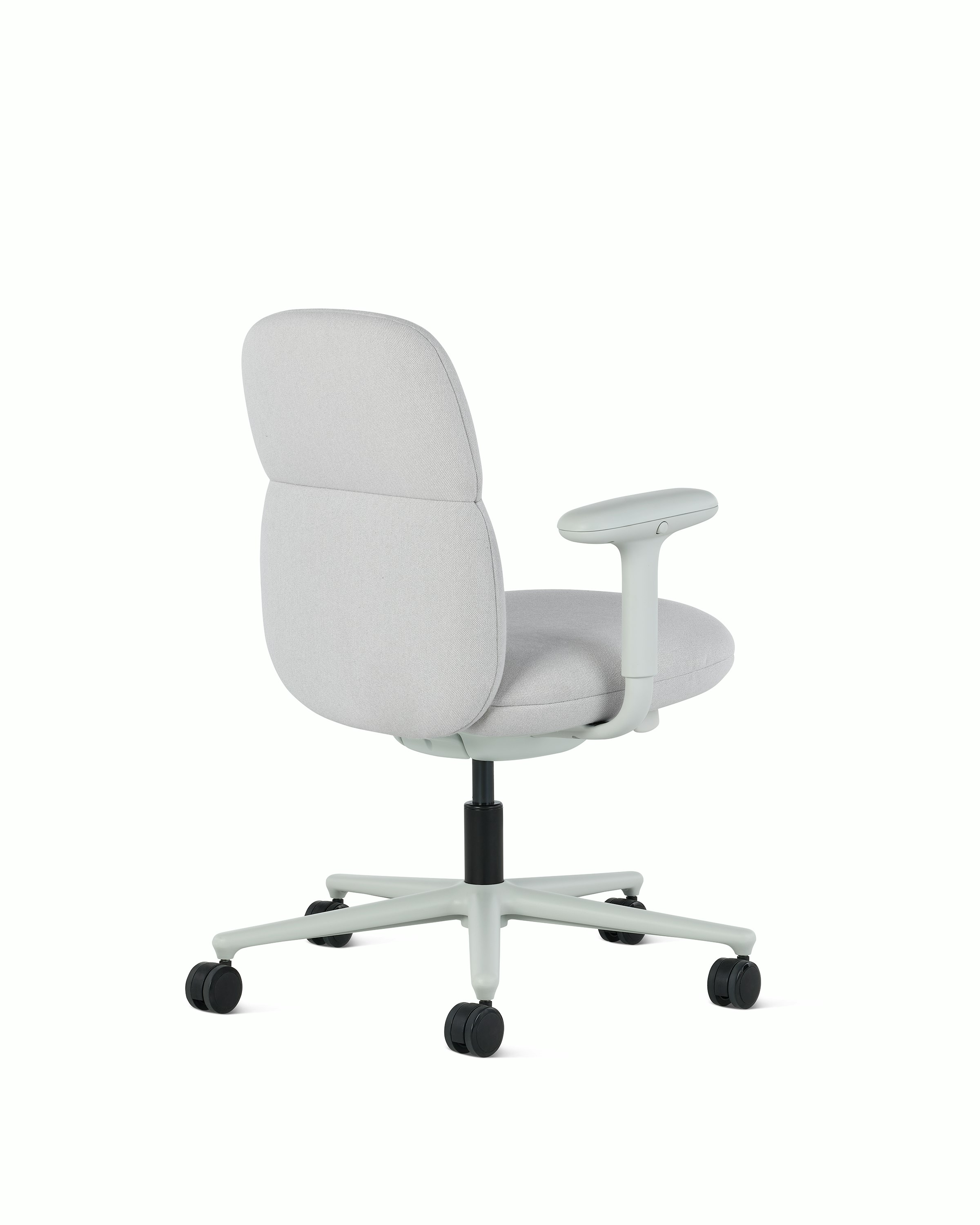 Rear angle view of a mid-back Asari chair by Herman Miller in light grey with height adjustable arms.