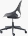Side view of a dark grey armless Zeph chair.