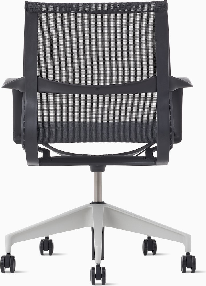 Rear view of a Setu chair in dark grey with a silver alloy base.