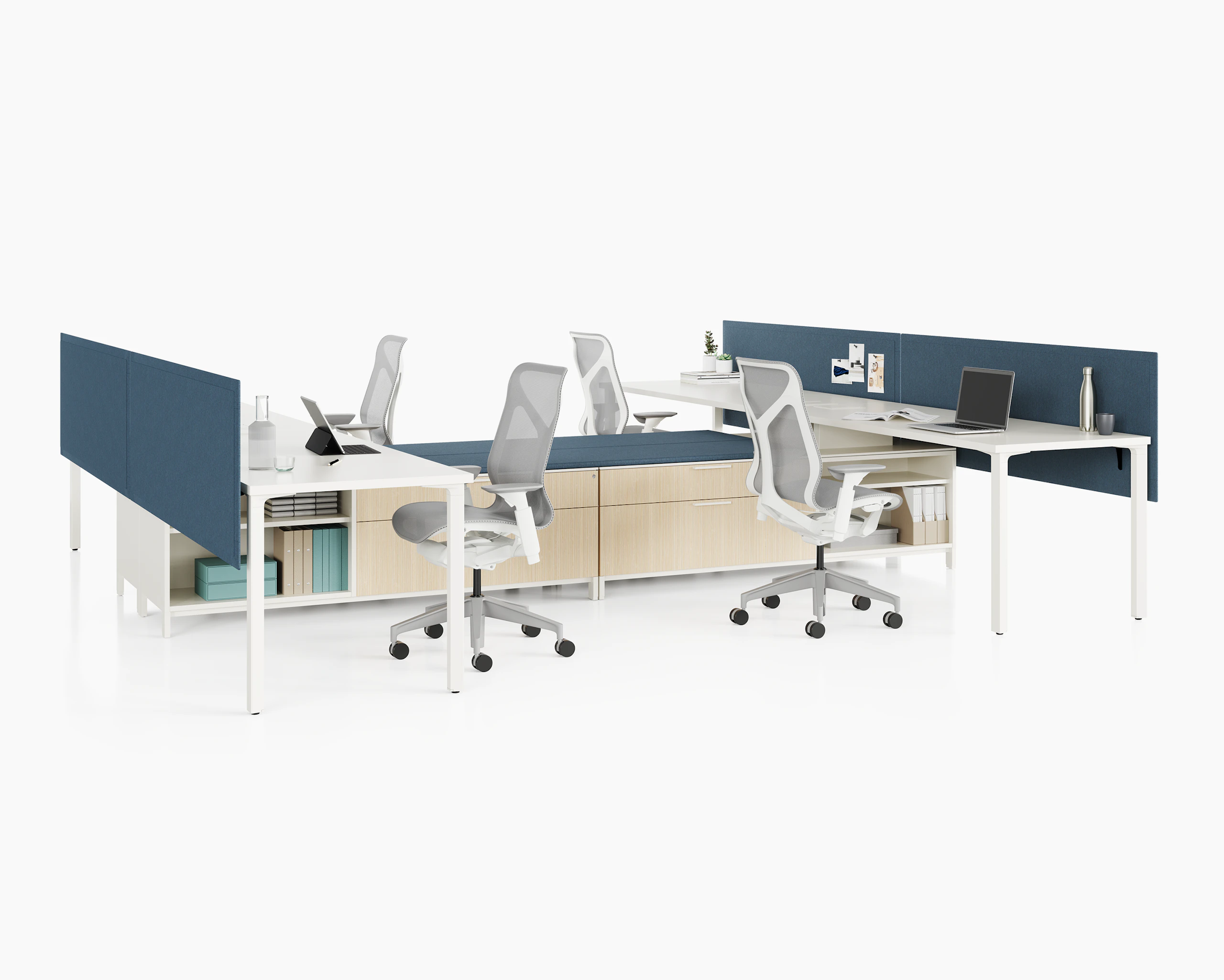 Group of four Canvas Storage workstations with white surfaces, blue screens, and grey Cosm Chairs.