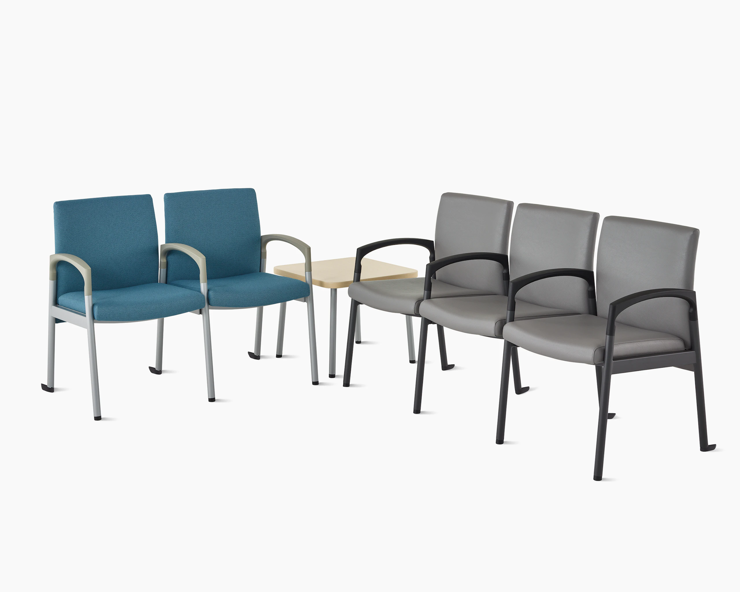 Valor two-seat multiple seating in blue with a silver frame, along with a Valor three-seat multiple seating in dark gray with black frame, and a Valor side table in ash wood laminate top and silver frame.
