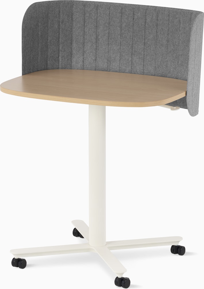 Large Passport Work Table with light woodgrain surface and white base shown on casters with a light grey screen.