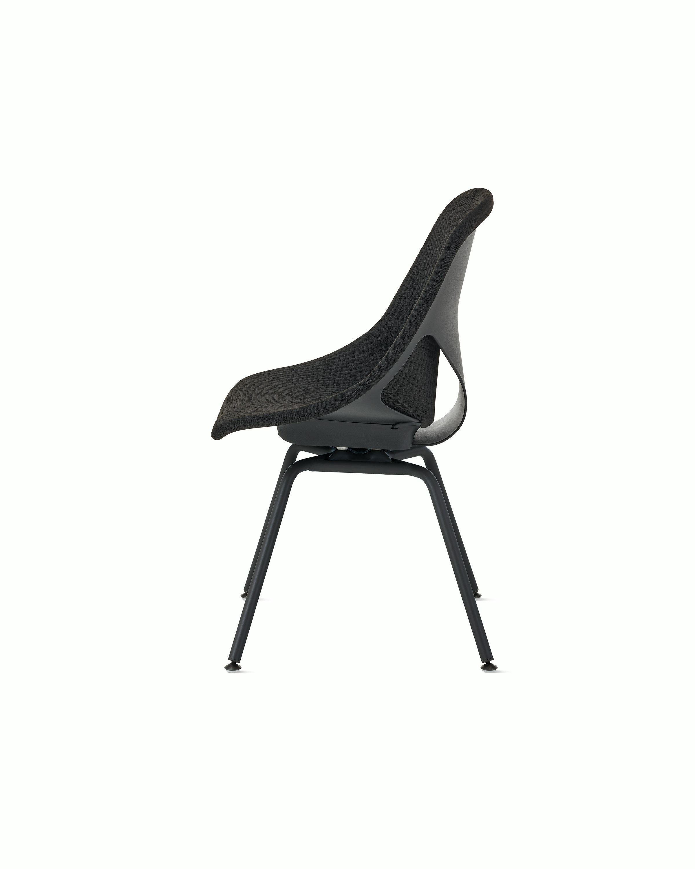 Side view of a black Zeph side chair without arms and a black unibody seat pad.