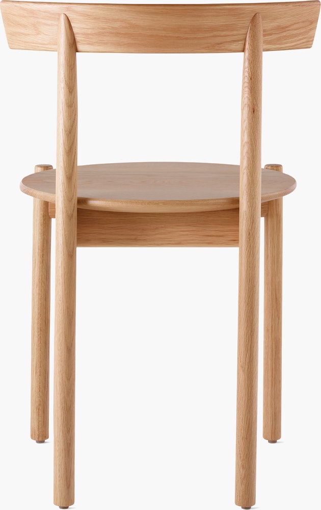 An oak Comma Chair, viewed from the back.