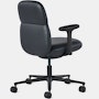 Rear angle view of a mid-back Asari chair by Herman Miller in black leather with height adjustable arms.