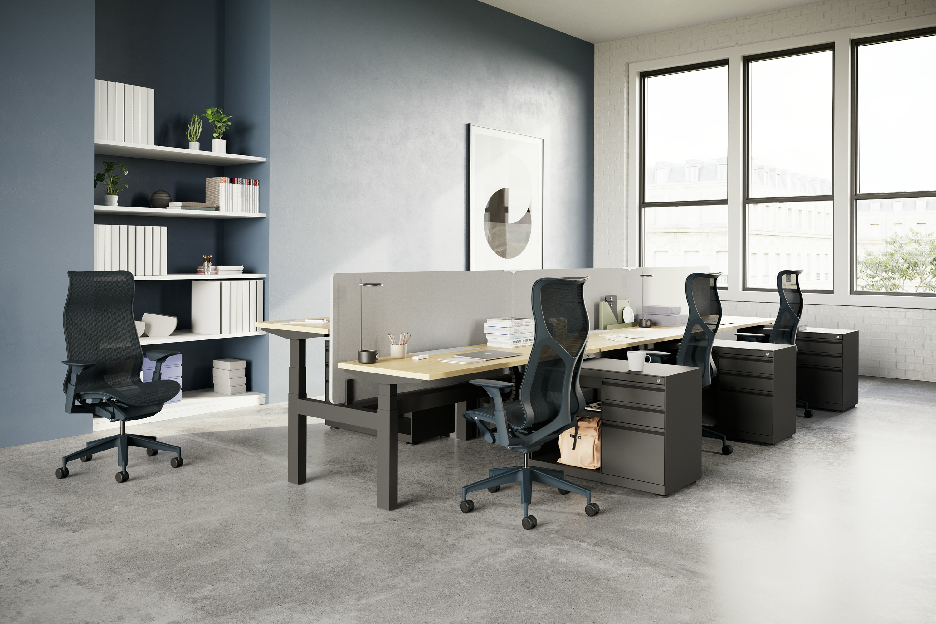 Cosm Chairs with height-adjustable arms in a workstation with height-adjustable tables.