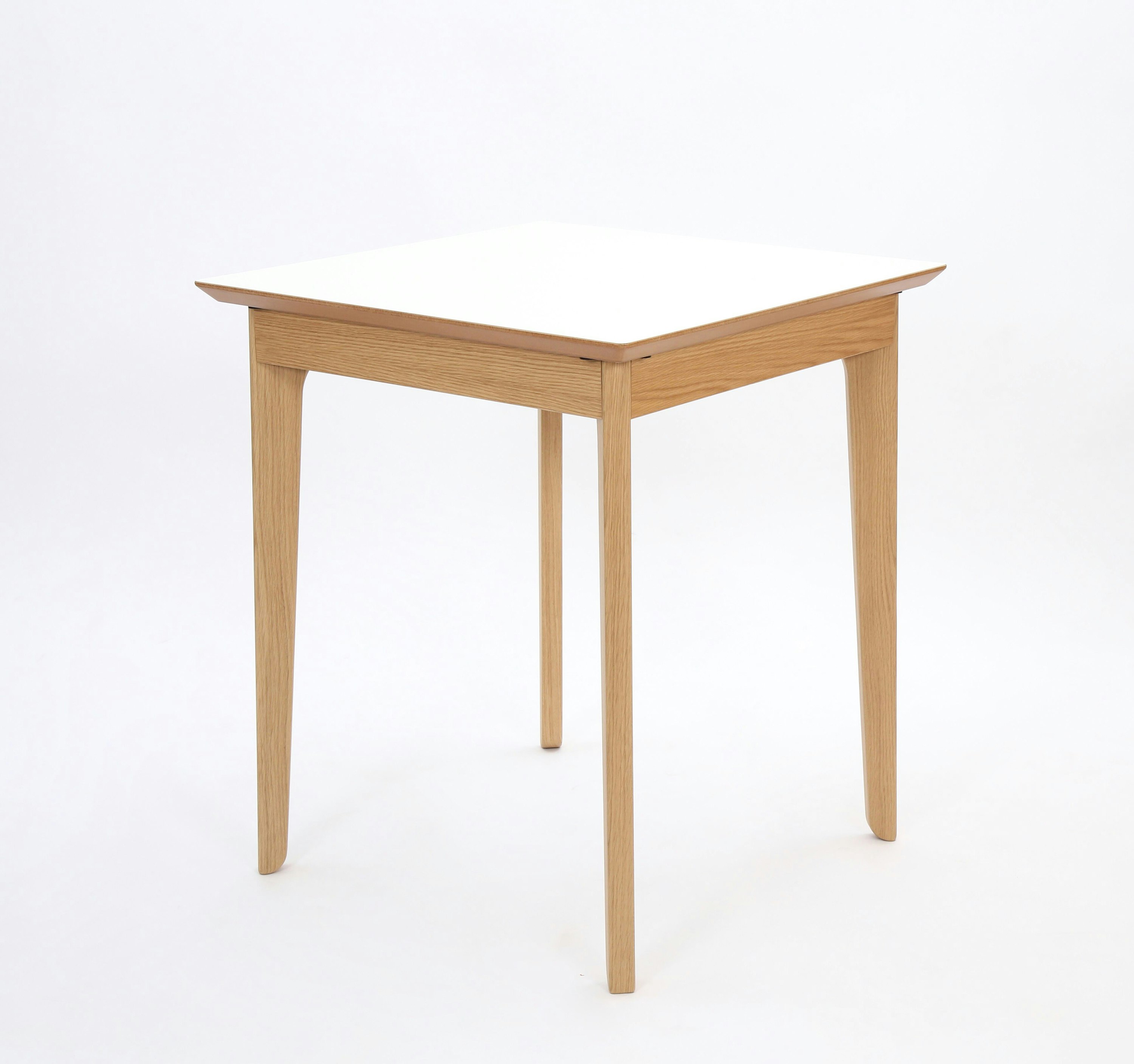 A square white naughtone Dalby Café Table, viewed at an angle.