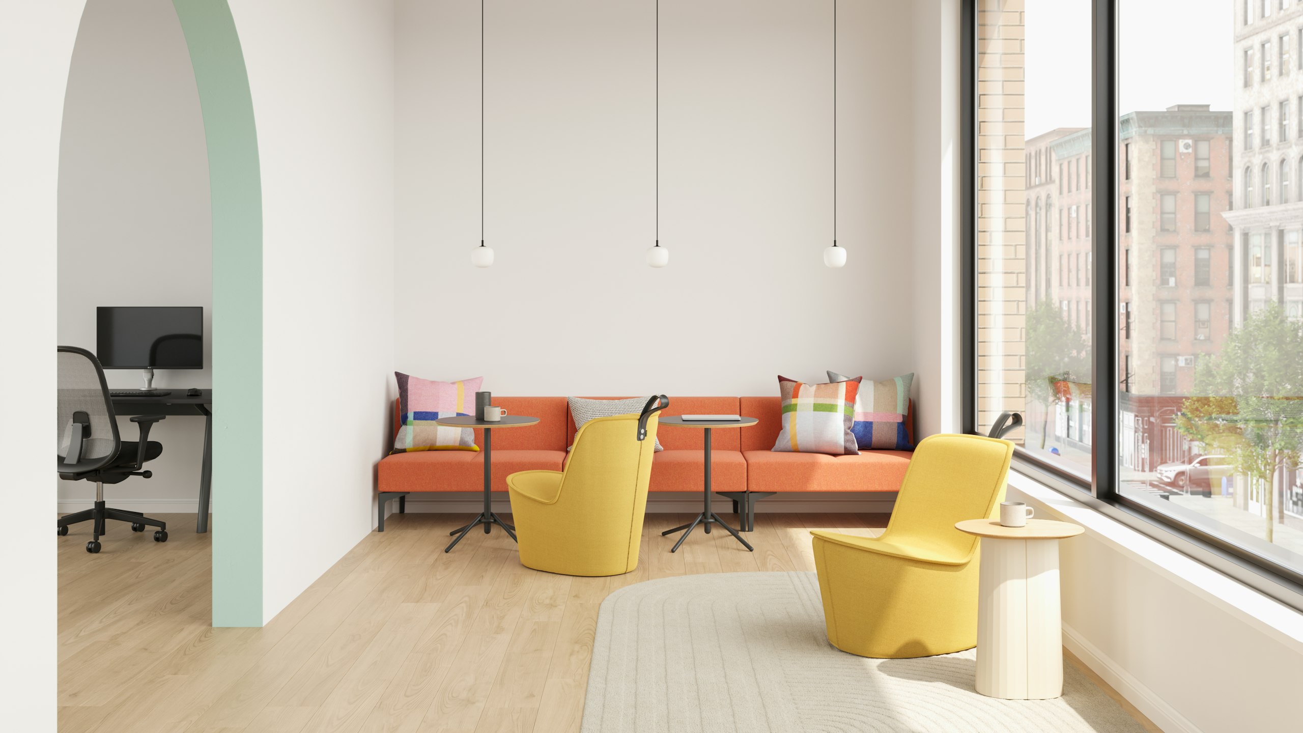 Two yellow Pippin lounge chairs sat with Symbol Modular Seating and Knot side tables.
